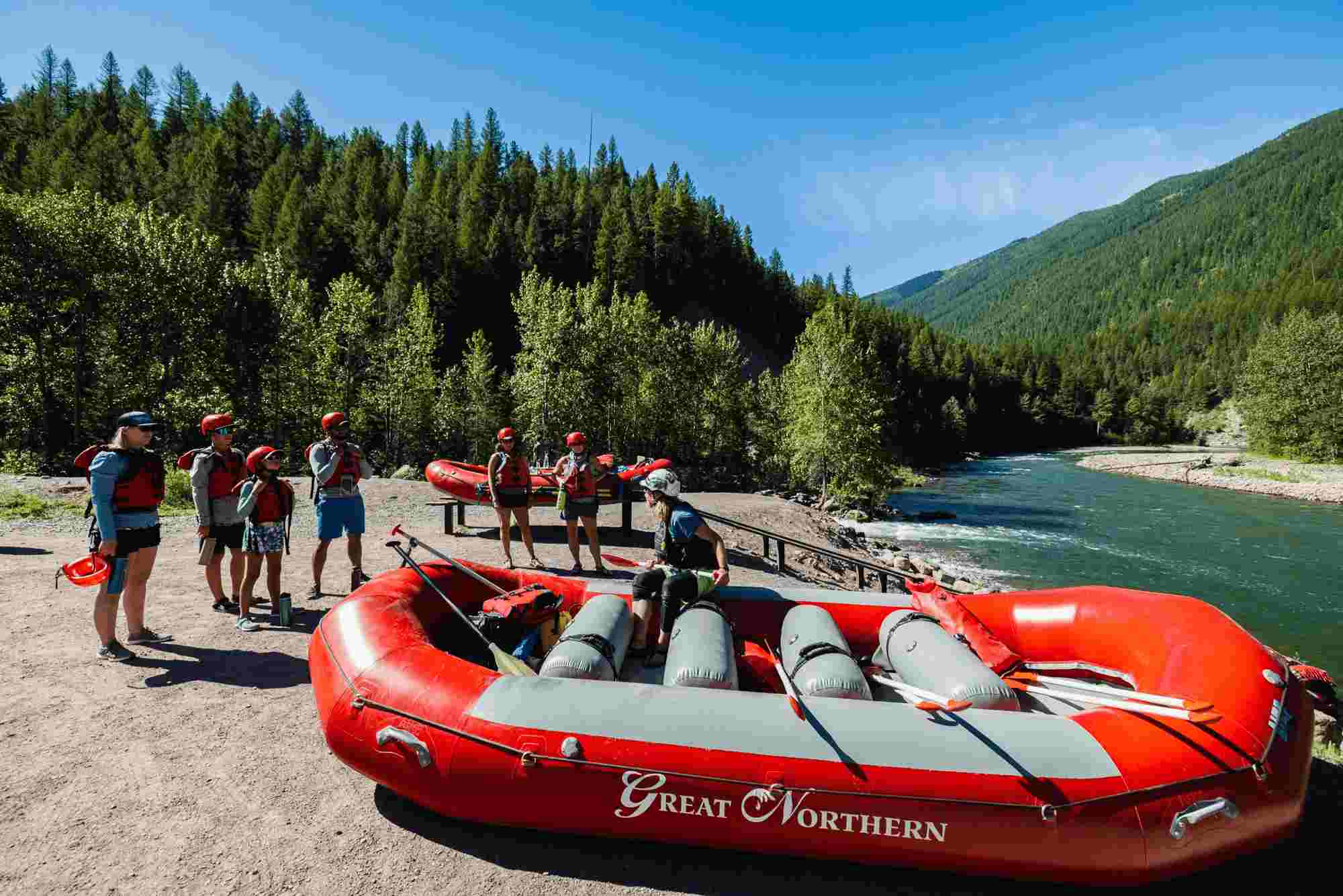 Group celebrating at riverside